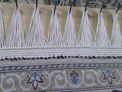 ریشه زنی فرش و قالی در اصفهان
